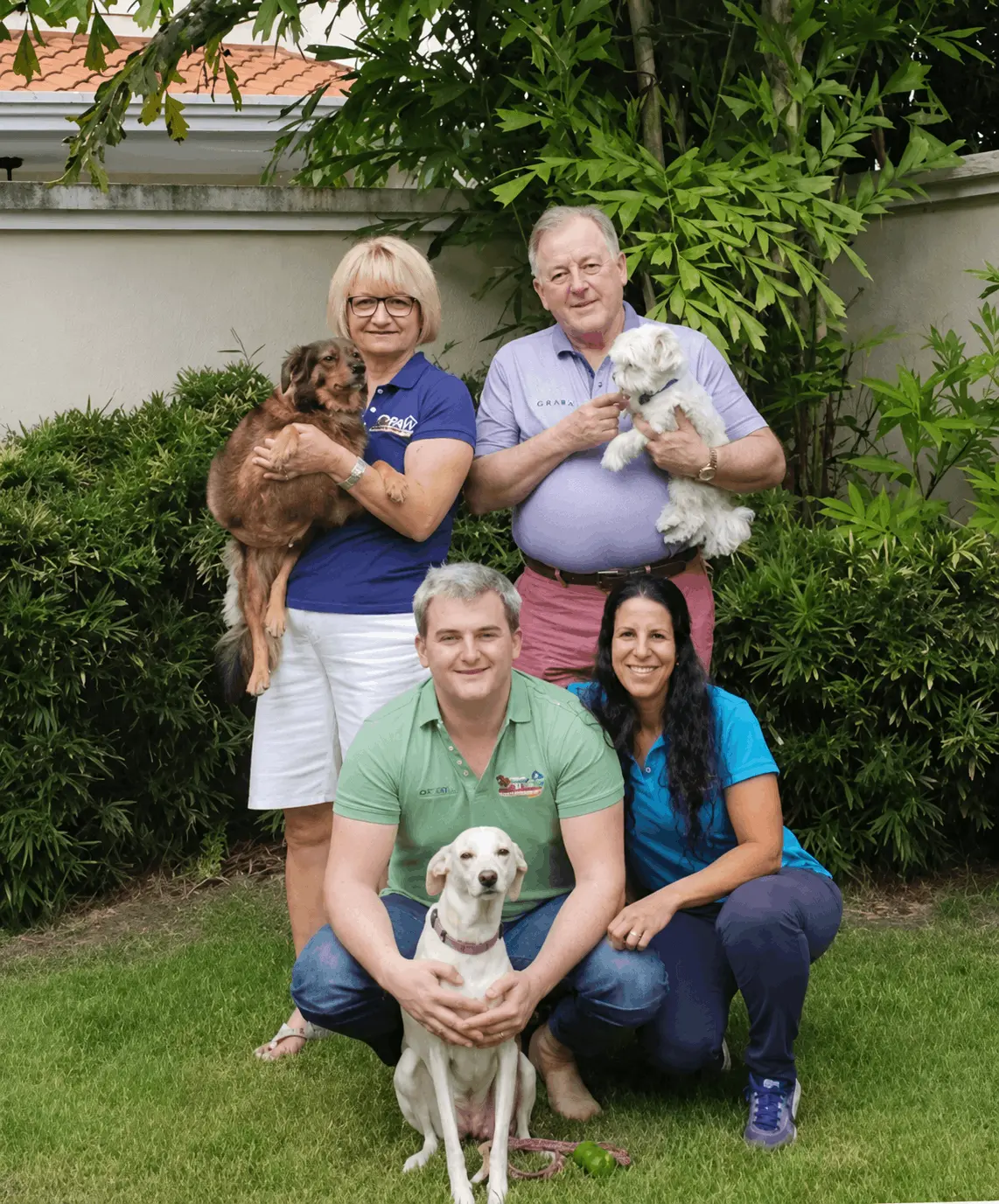 The VIP Vacation Kennels family with their pets
